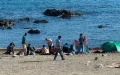 Un reparto de comida acaba en cargas policiales y gases lacrimógenos en Ceuta